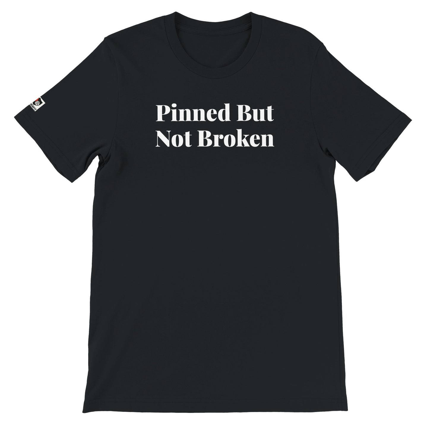 Black unisex t-shirt with the phrase ‘Pinned But Not Broken" printed on the front in white text